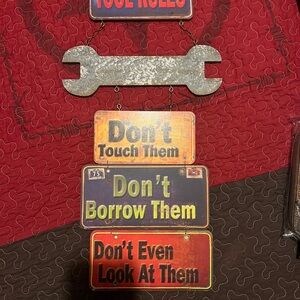 Vintage Metal Wall Decor with Wrench Design